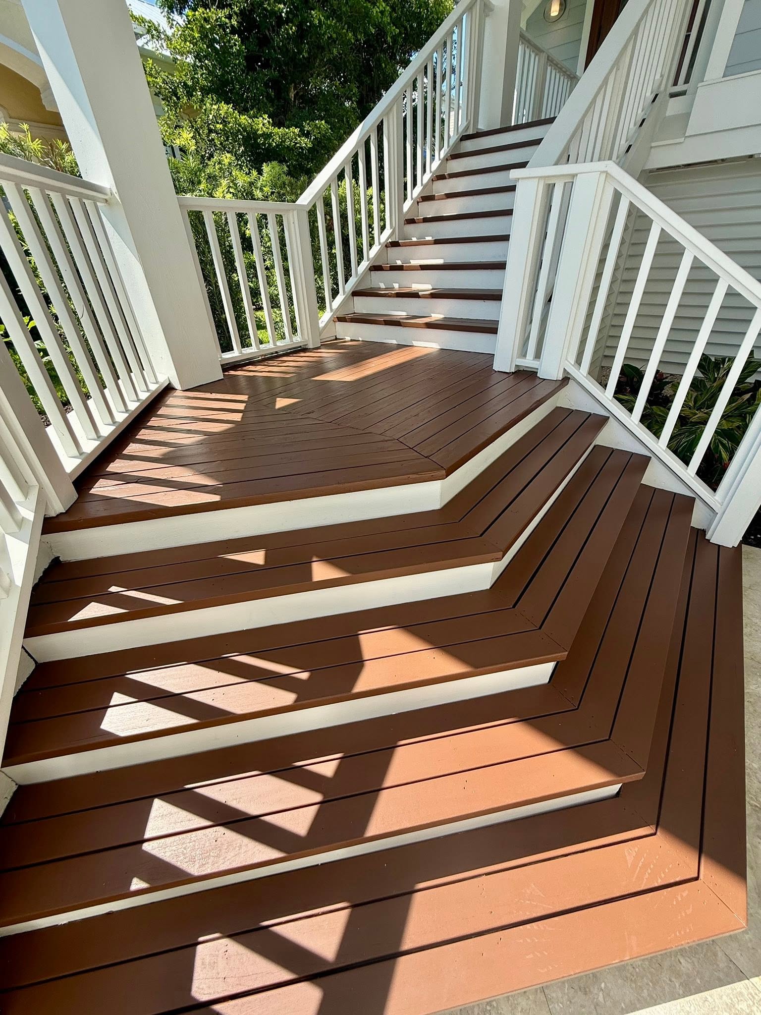Professional painter applying precise finish to residential trim